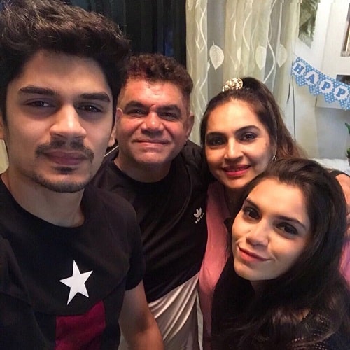 Chrisann Pereira with her parents and brother