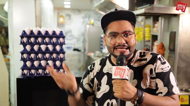 Deepak Kalra as a host in a show named 'Karchhi Kadhai aur Kalra' on the YouTube channel 'My Hunger Pangs'
