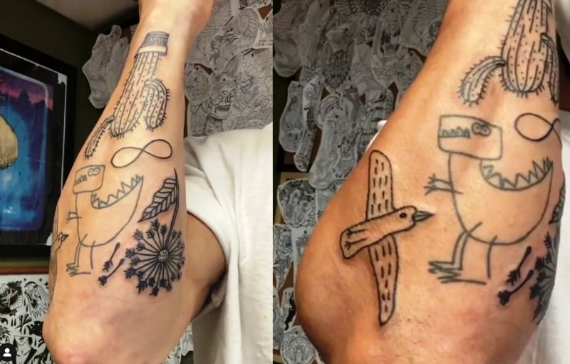 Finn's tattoos on his right arm