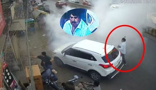 Guddu Muslim throwing bomb during an attack on Umesh Pal