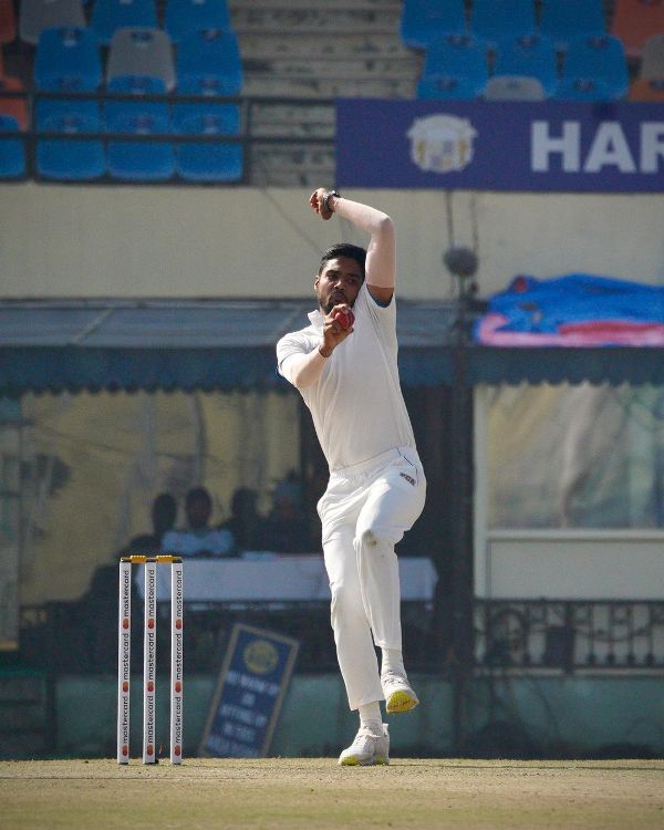 Gurnoor Brar bowling during a Ranji match