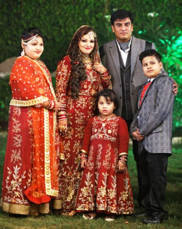 Irfan Solanki with his wife and children