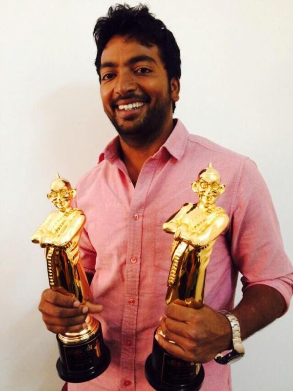 Kalaiyarasan with his awards he won in 2014 for the film Madras (2014)