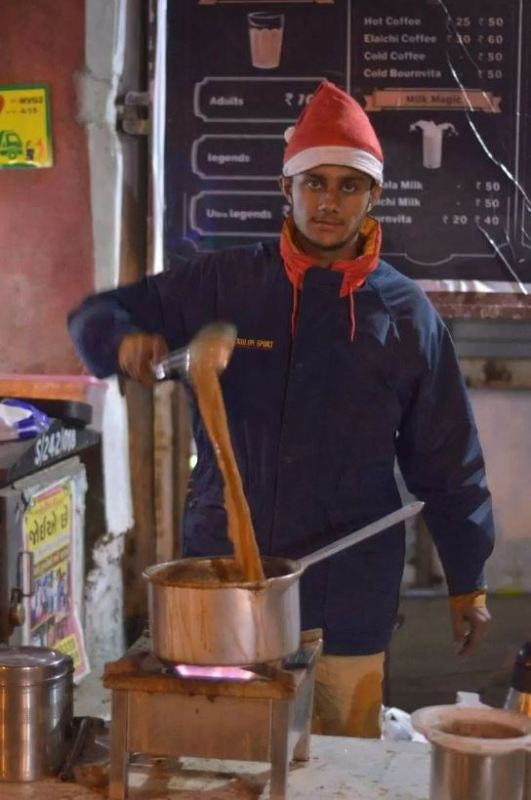 Prafull Billore making tea at his roadside stall in Ahmedabad, Gujarat