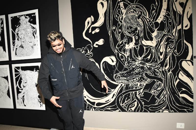 Santanu Hazarika with one of his art pieces at his exhibition, BLCK, at Gallery Art & Soul in Mumbai