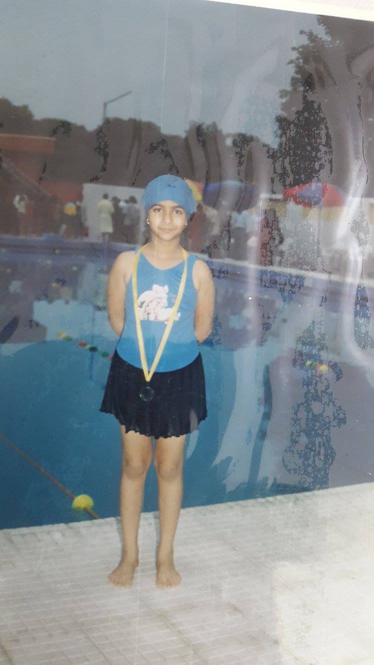 Saumya Pandey's photo with her bronze medal that she won in a swimming competition