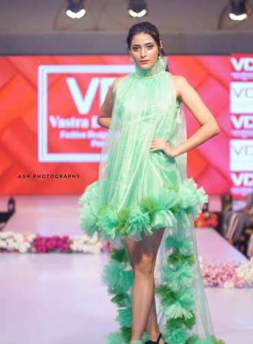 Shreya Poonja walking the ramp in a fashion show