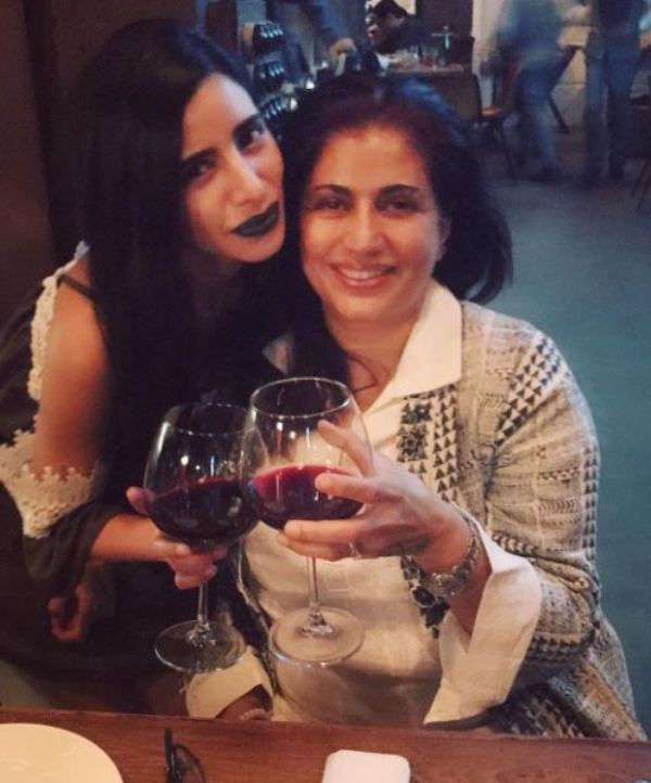 Soniya Mehra and her mother holding glasses of wine