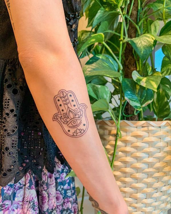 Soniya Mehra's Hamsa hand tattoo