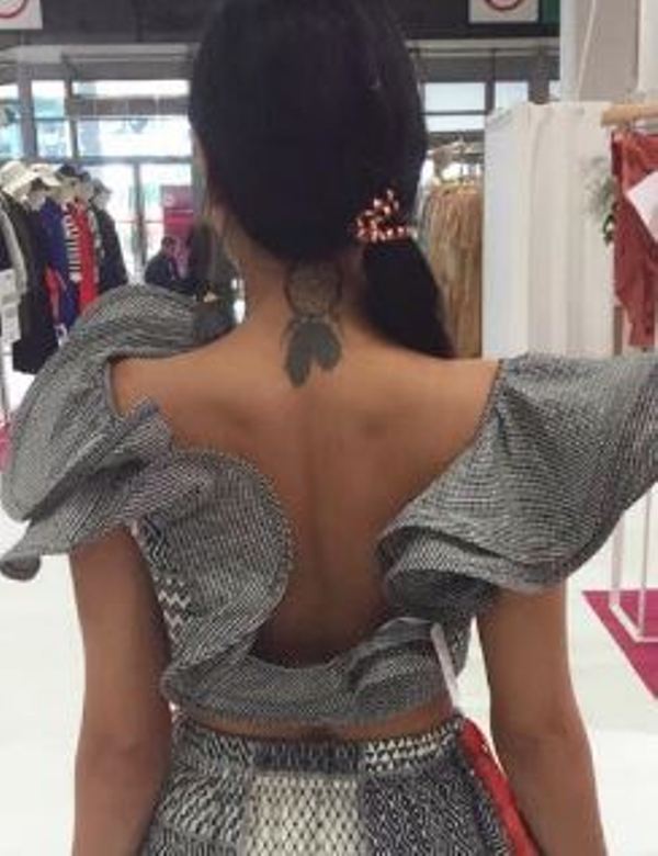 Soniya Mehra's tattoo on the back of her neck