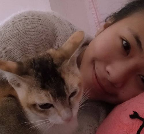 Strela Thounaojam Luwang with her cat