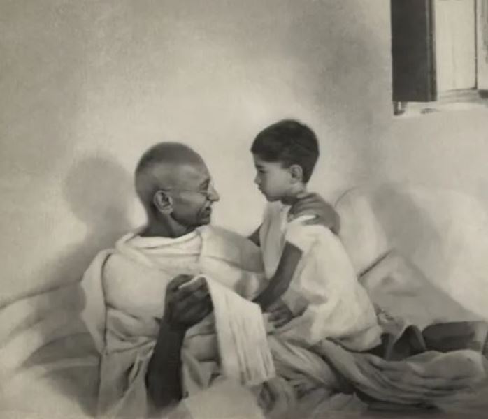 A childhood image of Arun Manilal Gandhi with his grandfather, Mahatma Gandhi