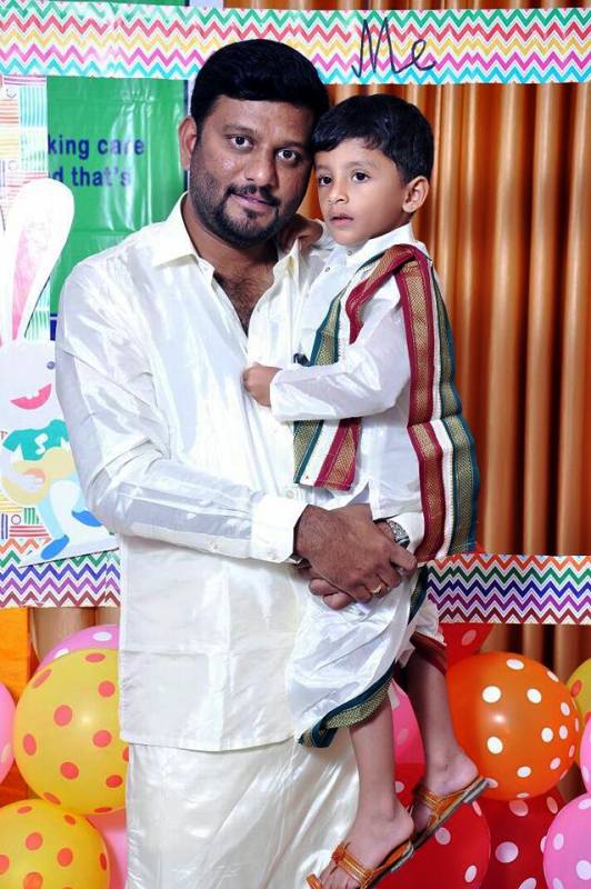 A photo of H. P. Swaroop with his son