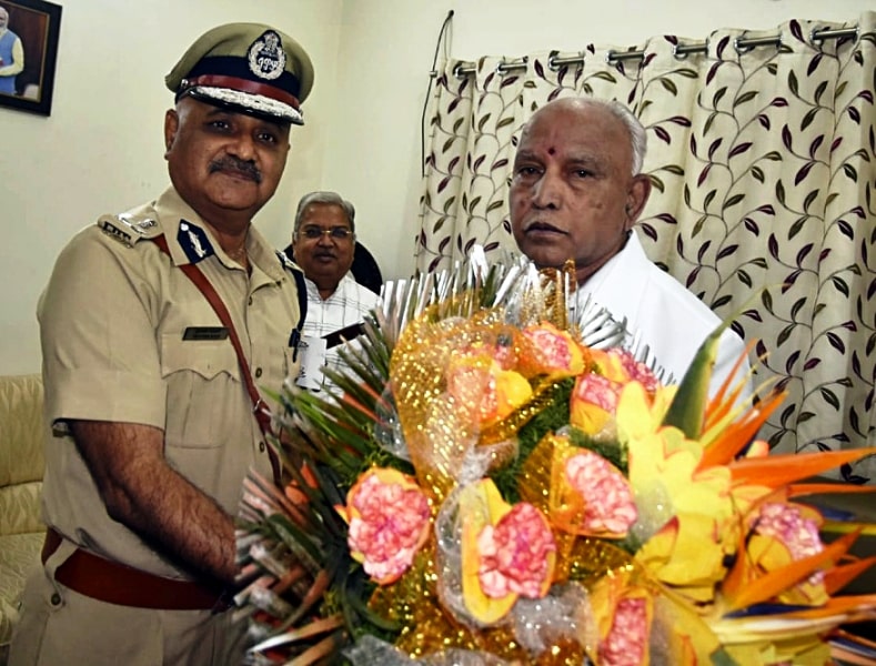 A photo of Praveen Sood with B. S. Yediyurappa, the then CM of Karnataka