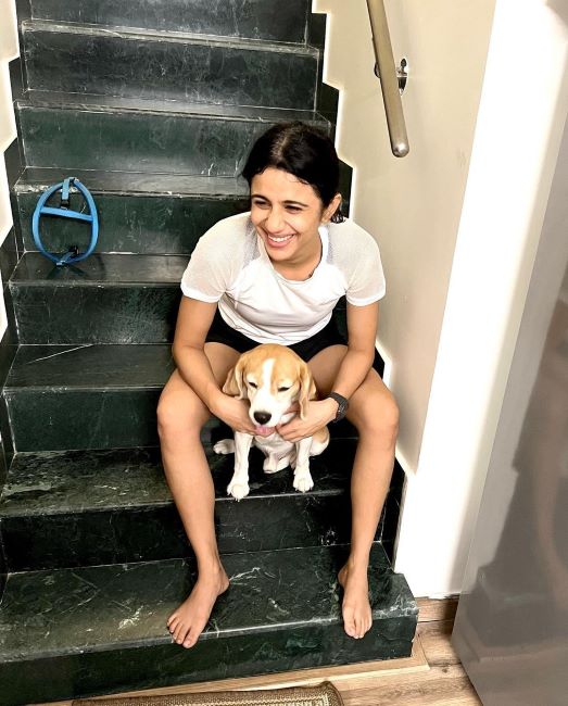 A photo of Shweta Pasricha with her pet Beagle