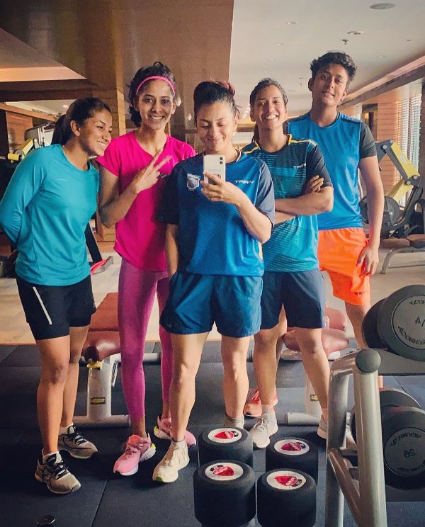 A photo of Utkarsha Pawar (centre, taking selfie) with her friends at a gym
