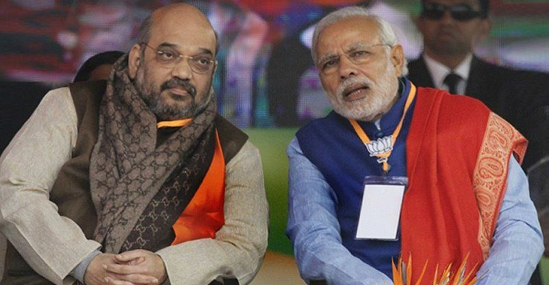 A photograph of Amit Shah and Narendra Modi attending a BJP meeting during the 2017 UP election campaign