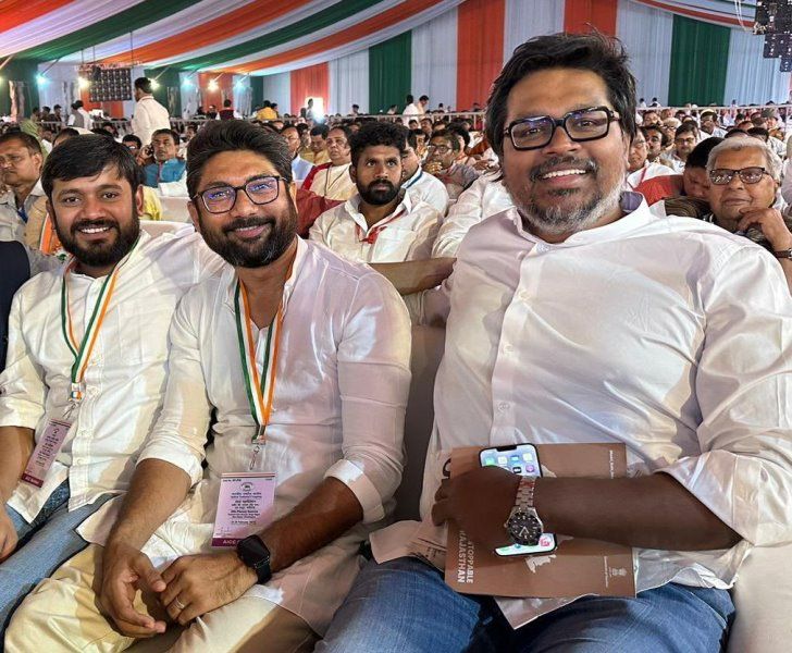 A photograph of Sunil Kanugolu (extreme right) attending a Congress conventionA photograph of Sunil Kanugolu (extreme right) attending a Congress convention