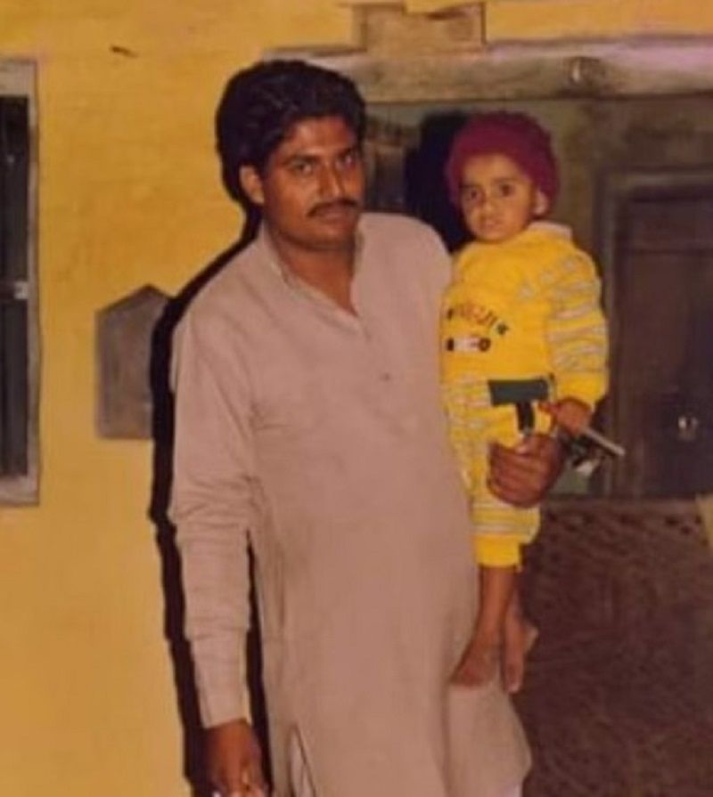 Abhinay Sharma as a child with his father