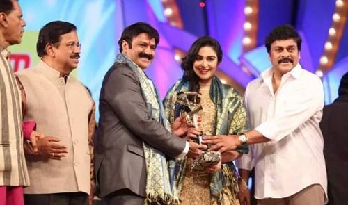 Adah Sharma receiving Santosham Award