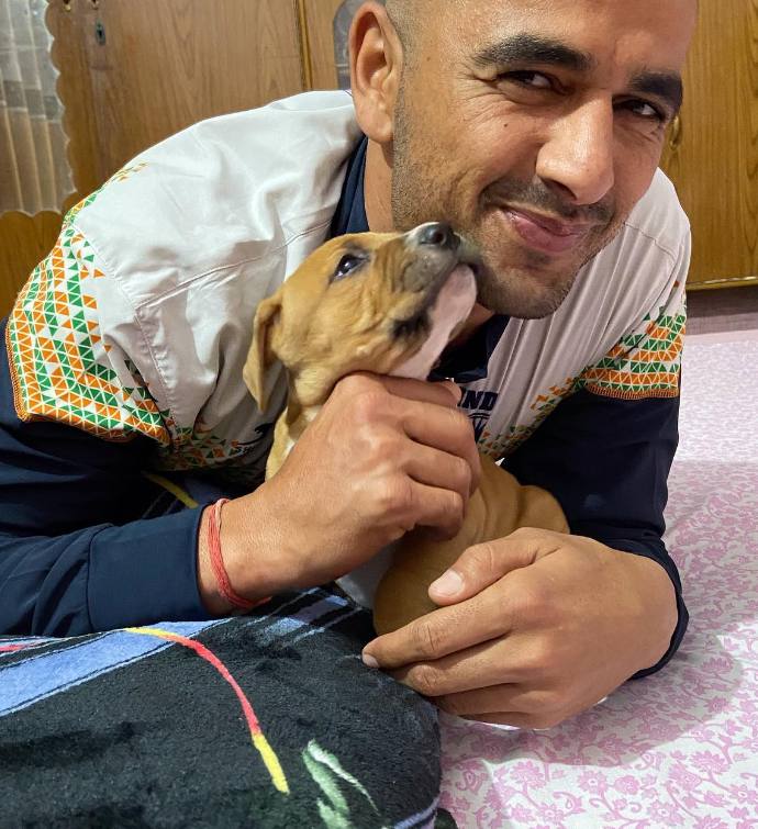 Ajay Thakur with his pet dog
