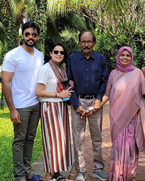 Arav with his parents and wife