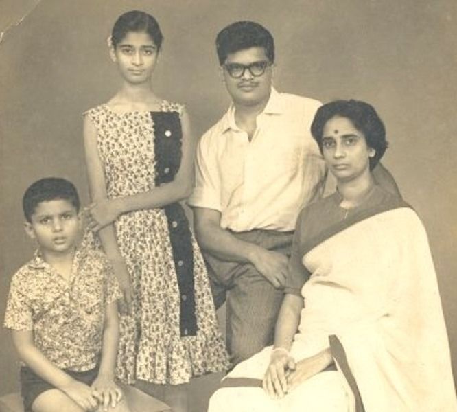 Arun Manilal with his wife and children