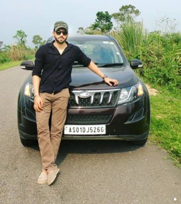 Ashutosh Patki with his car, Mahindra XUV