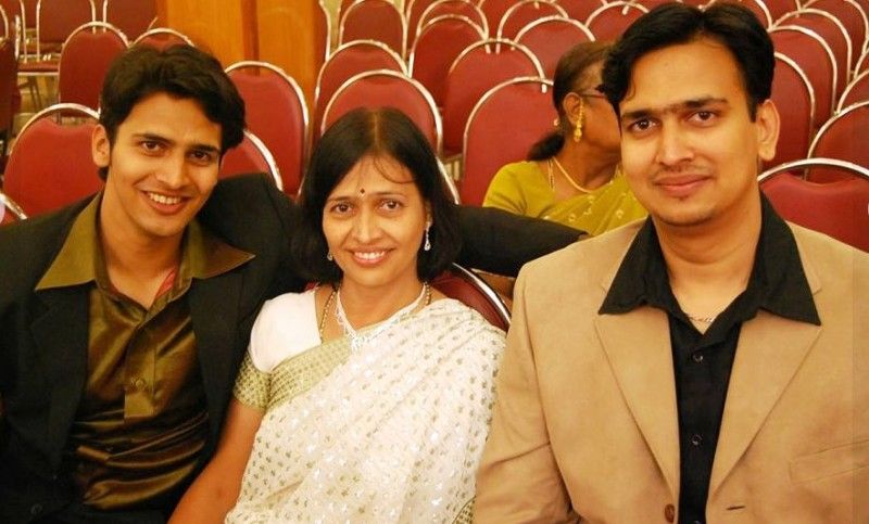 Bhushan Pradhan (extreme left) with his brother, Kaustubh Pradhan, and mother