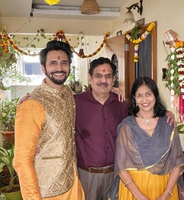 Bhushan with his parents