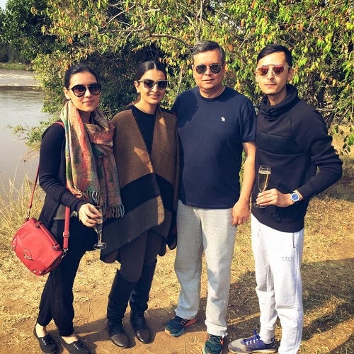 Drisha Roy with her father, mother, and brother