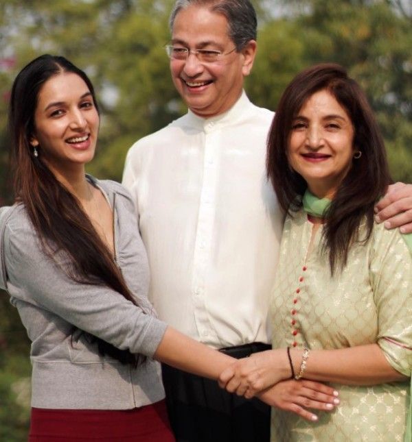 Ira Trivedi with her parents