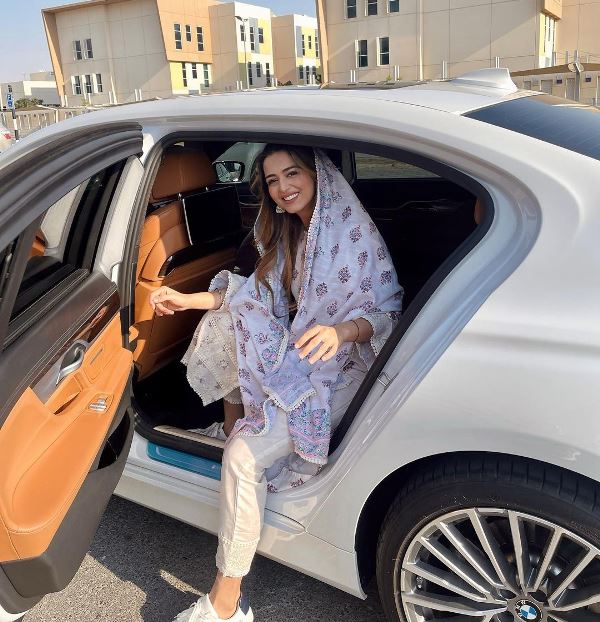 Jumana Khan sitting in her BMW car