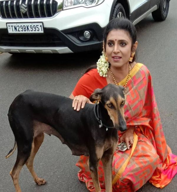 Kasthuri Shankar with a dog