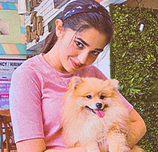 Krithi Shetty with a dog