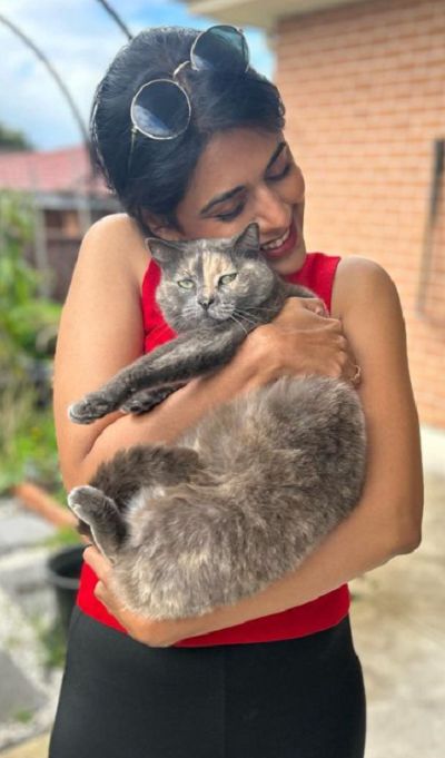 Madhura Deshpande with a cat