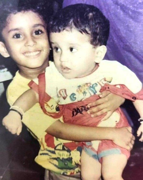 Mandar with his younger brother in his childhood