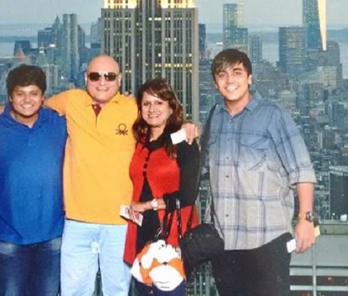 Manoj Joshi with his wife and sons
