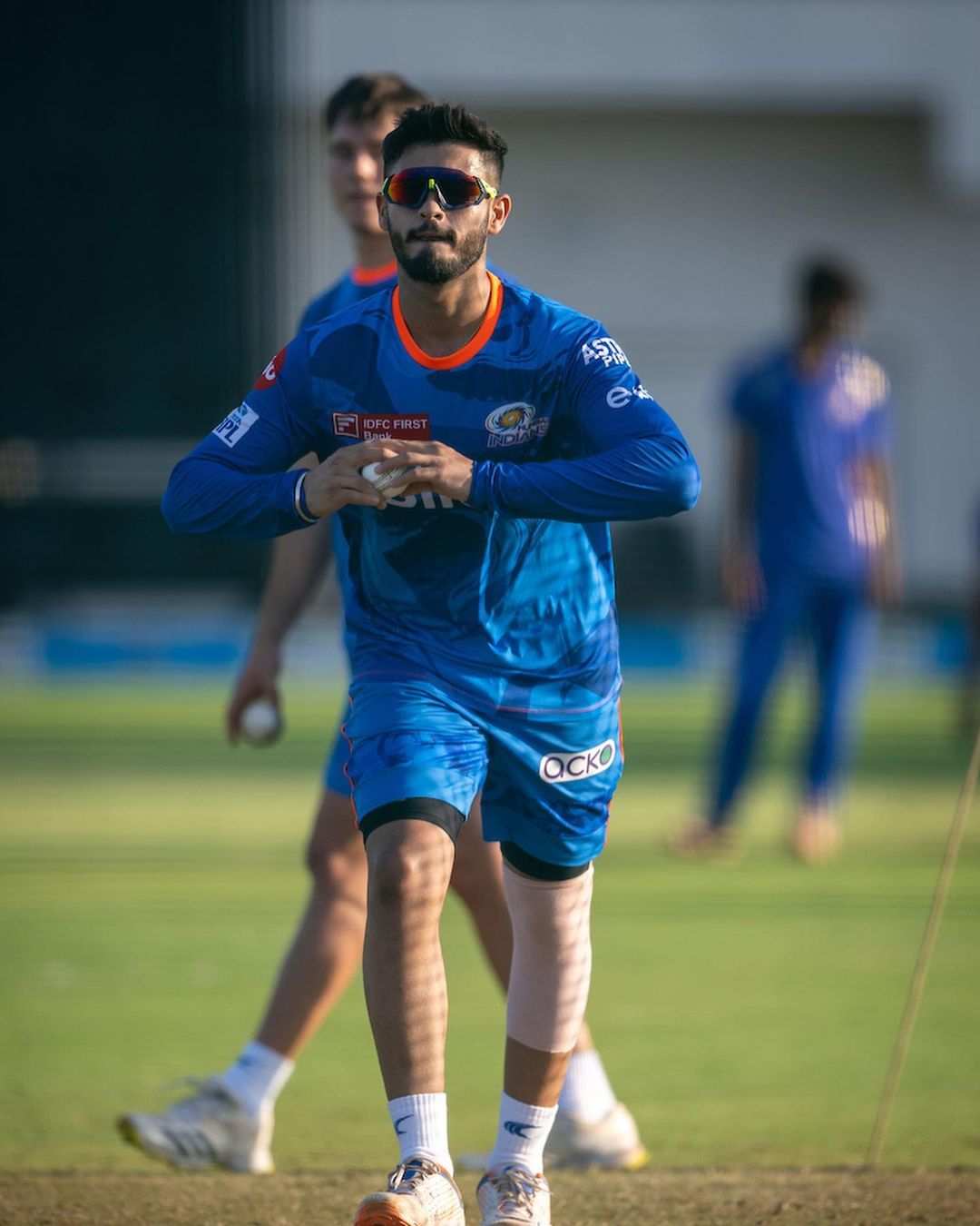 Nehal Wadhera bowling during a practice session