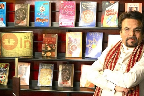Pandit P Khurrana with his books