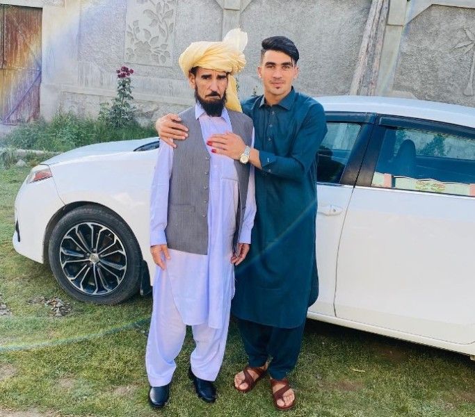 Rahmanullah Gurbaz (right) with his father