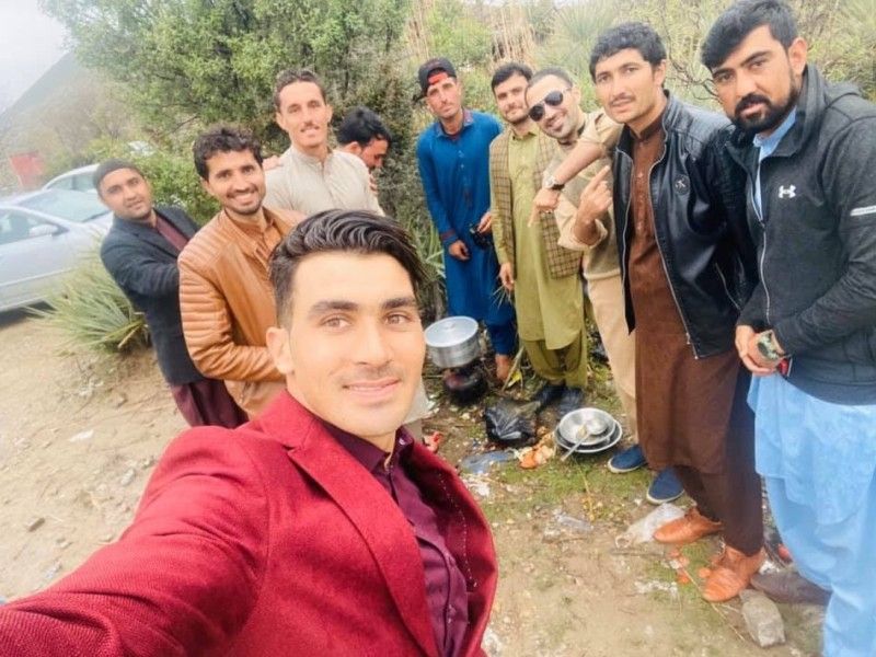 Rahmanullah Gurbaz taking a selfie with his friends