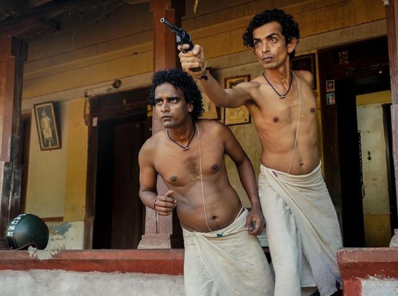 Rajesh Madhavan (right) as Shankaran Namboodiri in a still from the film 'Madanolsavam' (2023)