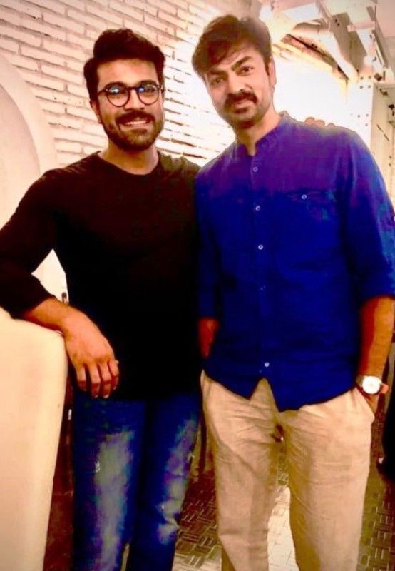Ravi Varma (on the right) standing with famous Indian actor Ram Charan