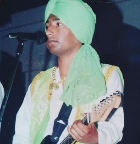 Romy performing during his college days