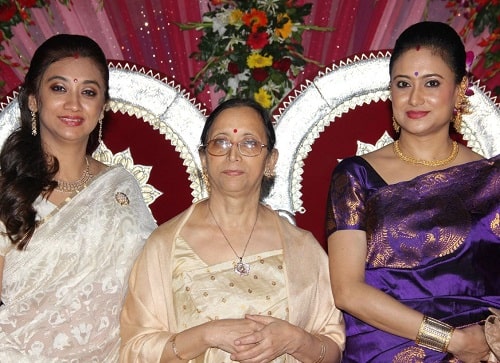 Rupali Barua with her mother and sister