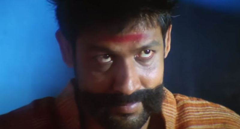 Sampath Raj as Sivanandi in a still from the film Neranja Manasu (2004)
