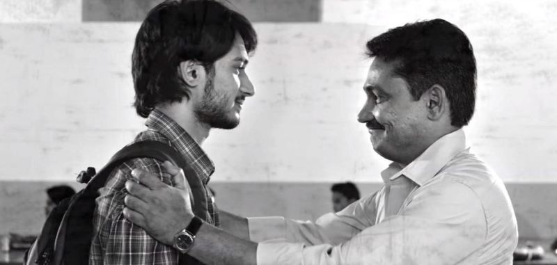 Sanjeev Tyagi and Amol Parashar in a still from the film 'Money Devo Bhava' (2011)