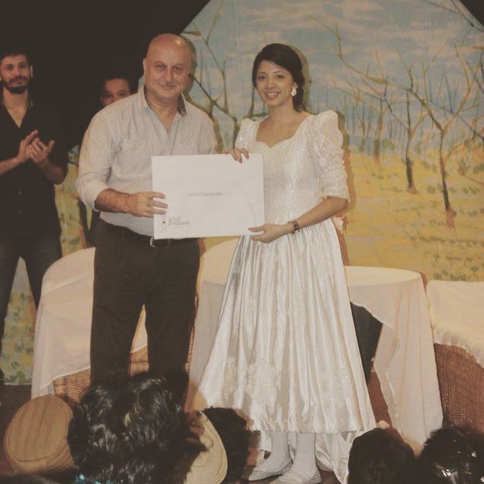 Snehal Rai being awarded certificate of diploma by Anupam Kher