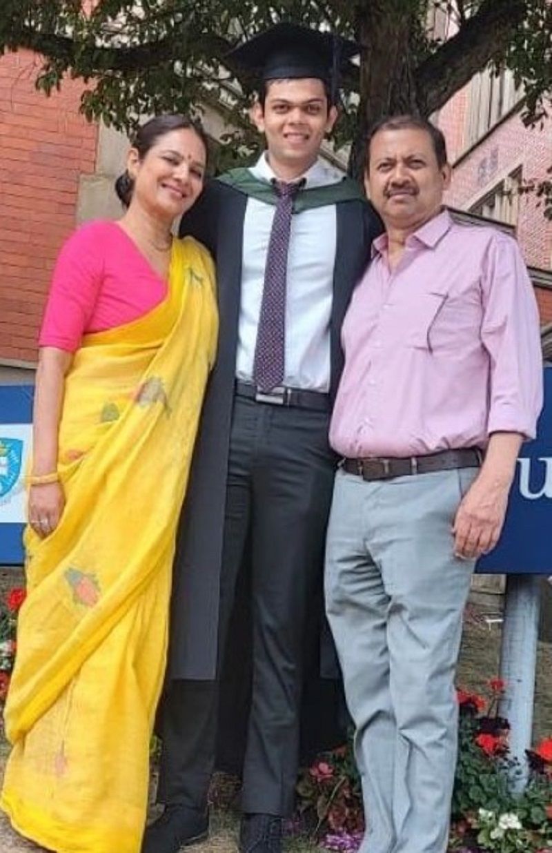 Sonal Jha with her son (centre) and husband (right)